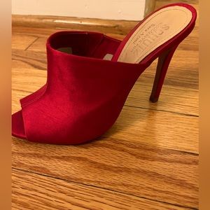 Hot pink satin slip on heels by Schutz